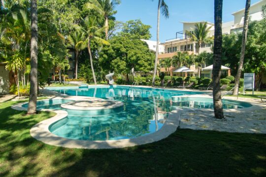 Spacious 1-Bedroom Condo at Infiniti Blu, Sosúa – Steps from the Pool & Beach
